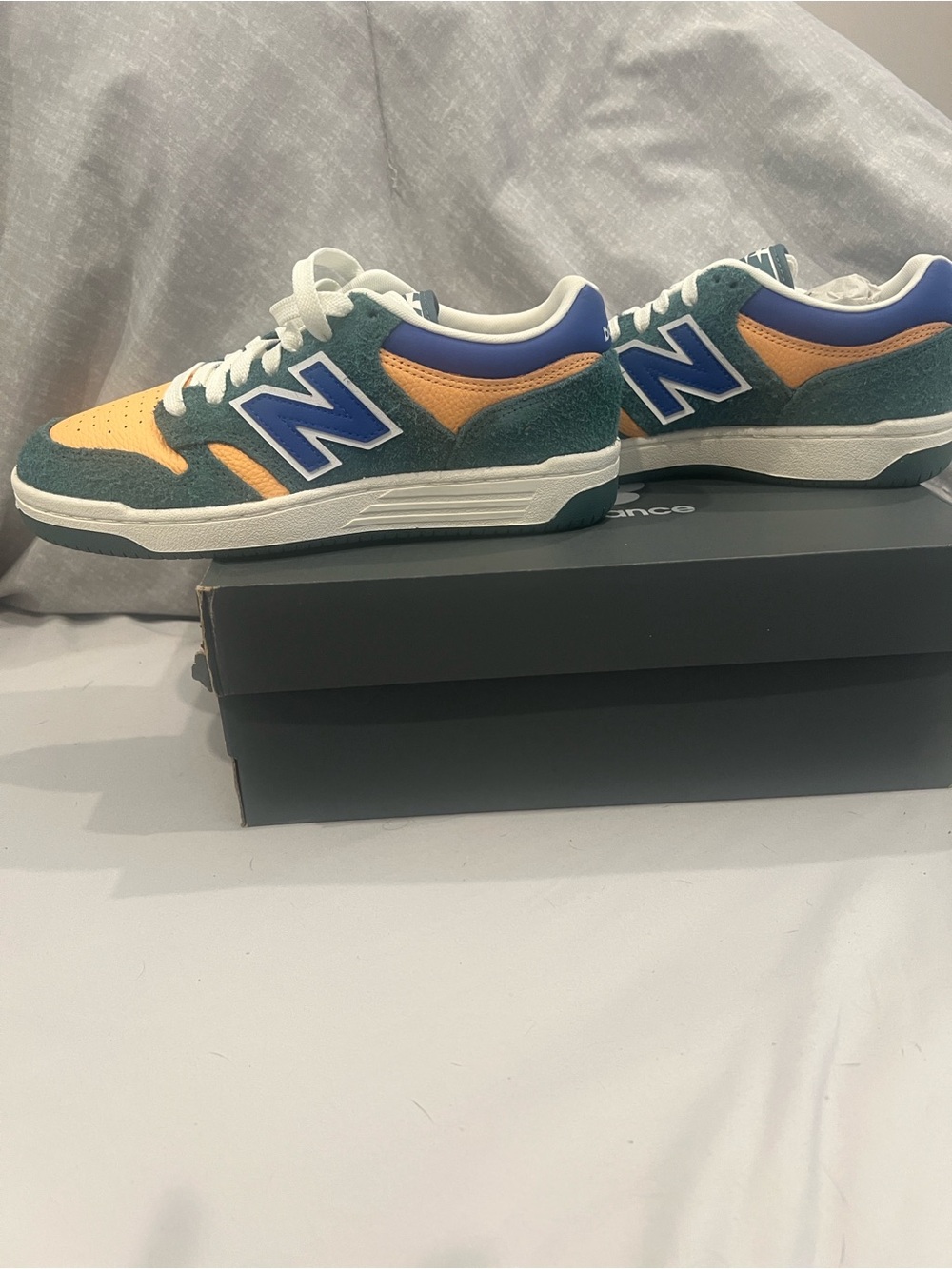 New Balance Kids Sneakers in Teal, Blue, and Yellow